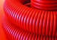 Труба гофрированная двустенная ПНД d110 с протяж. с муфтой SN8 450Н красн. (уп.100м) DKC 121911100